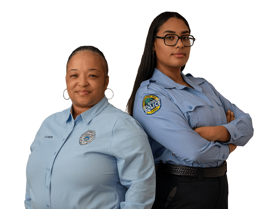 Two policewomen standing next to each other.